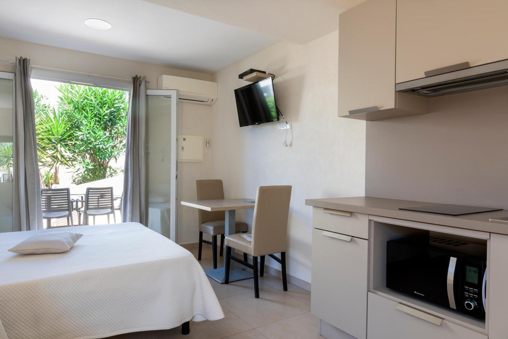 Hotel Et Residence Ta Kladia - Omigna การ์แฌส ภายนอก รูปภาพ